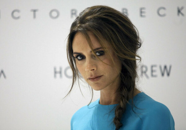 Victoria Beckham poses for the media and fans at Holt Renfrew Vancouver while in town prompting her fashion line in Vancouver, British Columbia June 15, 2012. REUTERS/Ben Nelms  (CANADA - Tags: FASHION ENTERTAINMENT) [PNG Merlin Archive]