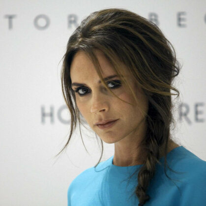 Victoria Beckham poses for the media and fans at Holt Renfrew Vancouver while in town prompting her fashion line in Vancouver, British Columbia June 15, 2012. REUTERS/Ben Nelms  (CANADA - Tags: FASHION ENTERTAINMENT) [PNG Merlin Archive]